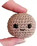 Avocado Family Amigurumi Pattern step 4 - final assembly and finishing